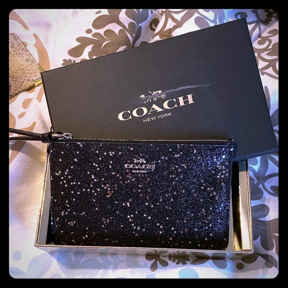 Coach black and silver star wristlet